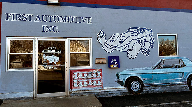 auto repair near liverpool ny from first automotive building entrance and mural