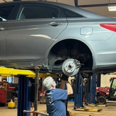 brake replacement near liverpool ny thumbnail image of the first automotive worker replacing brake