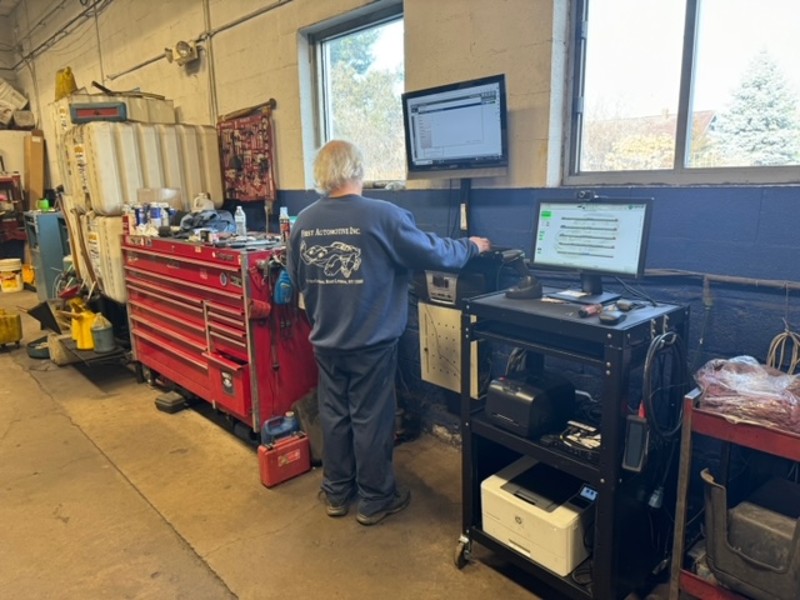 auto inspection near liverpool ny image of first automotive worker completing an auto inspection for customer