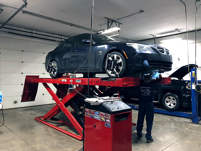 auto alignment near liverpool ny from first automotive mechanic doing a wheel alignment