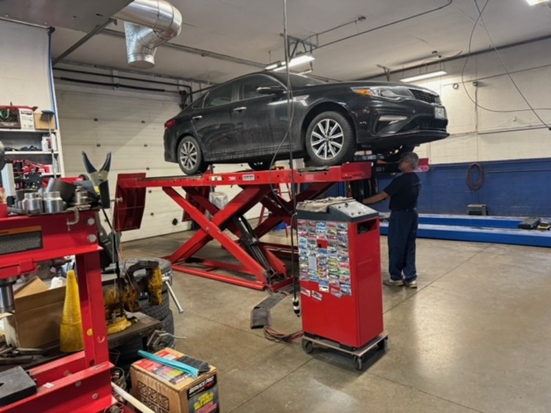 auto alignment near liverpool ny image of first automotive worker completing an auto alignment on a car