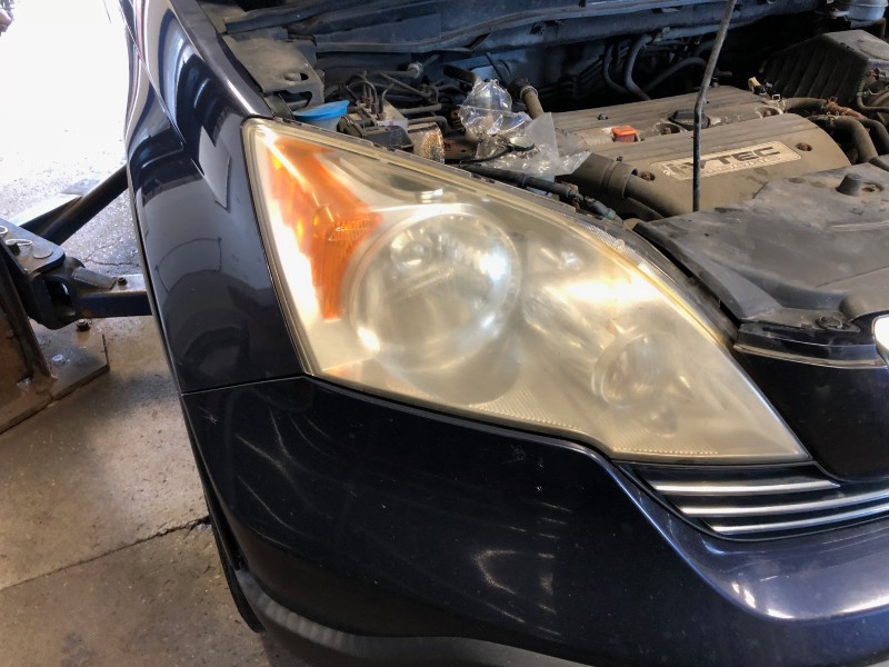 auto services near liverpool ny image of a headlight restoration project before image from first automotive 