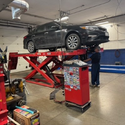 auto alignment near liverpool ny thumbnail image of the first automotive worker doing an auto alignment on car